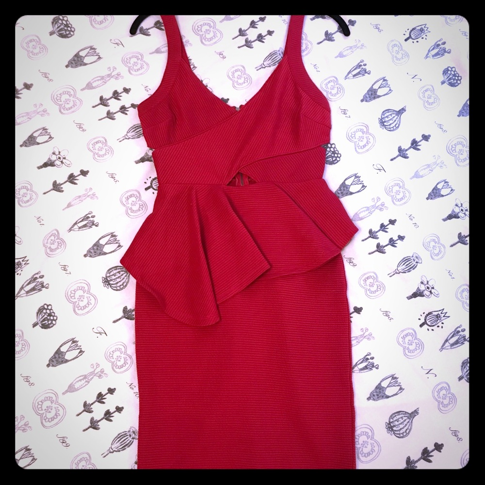 Bodycon red dress with flounce peplum and cutouts